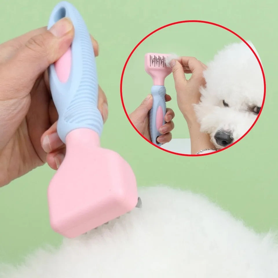 Stainless steel dog comb with knot knife edge and massage nodules, shown in pink colour option