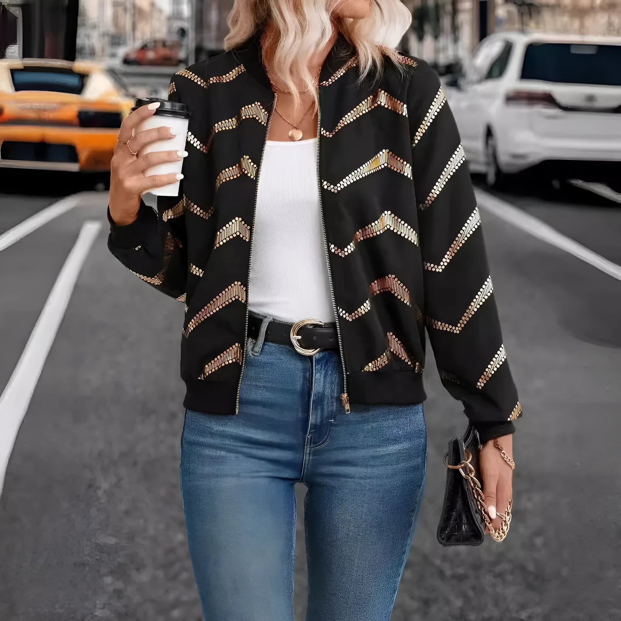 Women's black polyester spring jacket with zigzag gold print, conventional long sleeves, front view