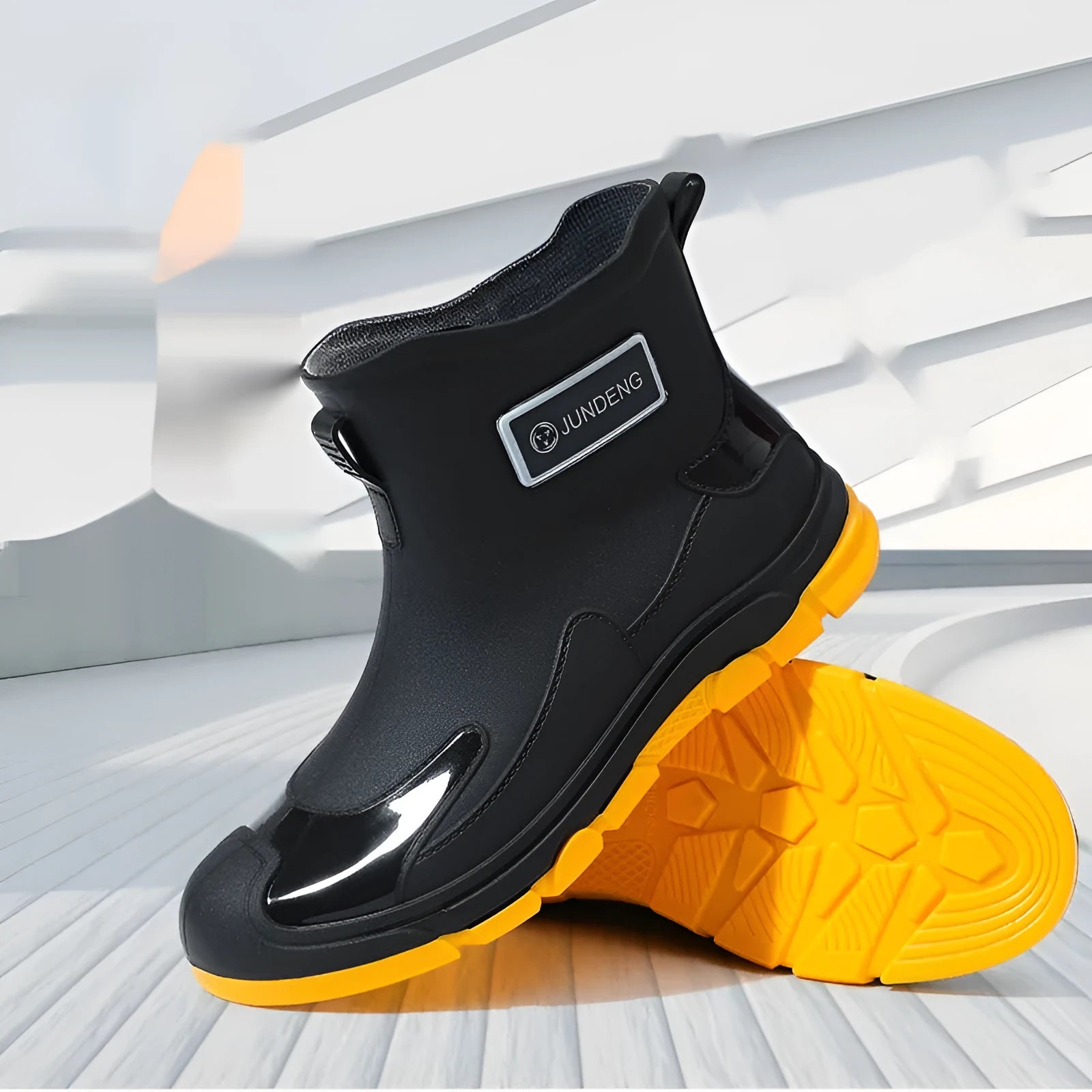 Adult short tube waterproof wading boots in a minimalist style with a non-slip sole.