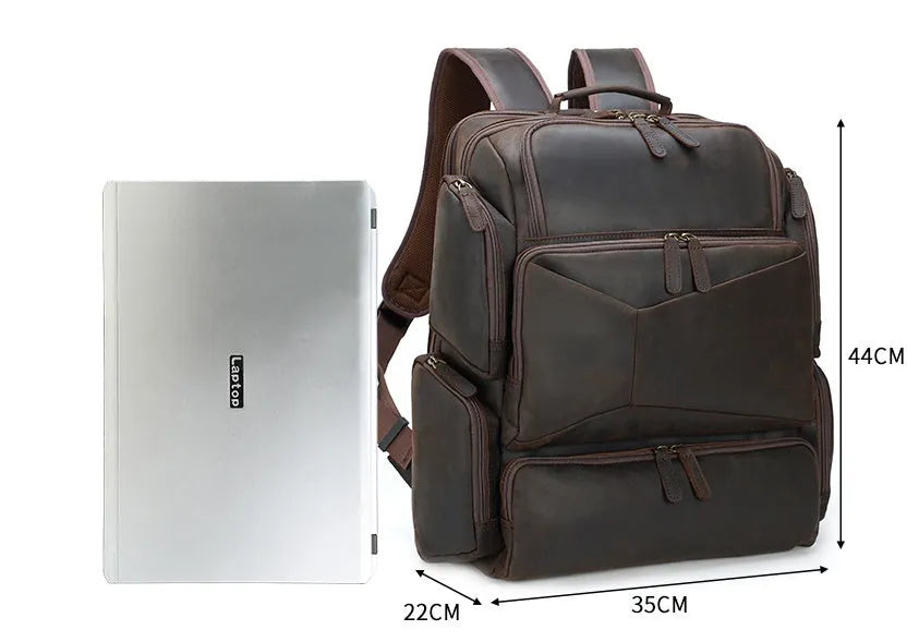 Dark brown retro crazy horse leather men's backpack with a 17-inch laptop compartment and double straps.