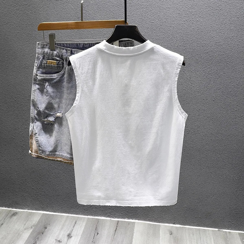 Cotton sleeveless t-shirt in loose fit with straight hem, black and white colour options