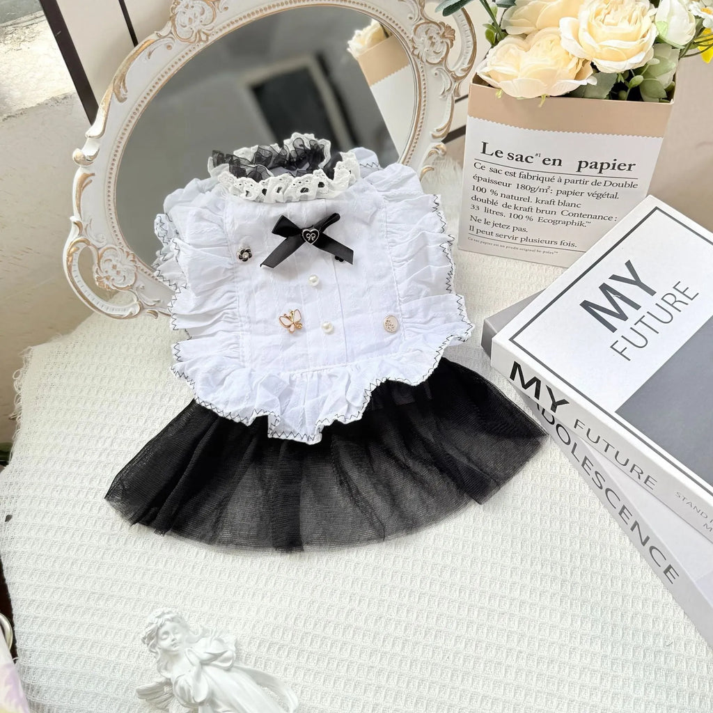 White yarn princess-style Waltz gauze skirt costume on a small dog, showing tiered design.