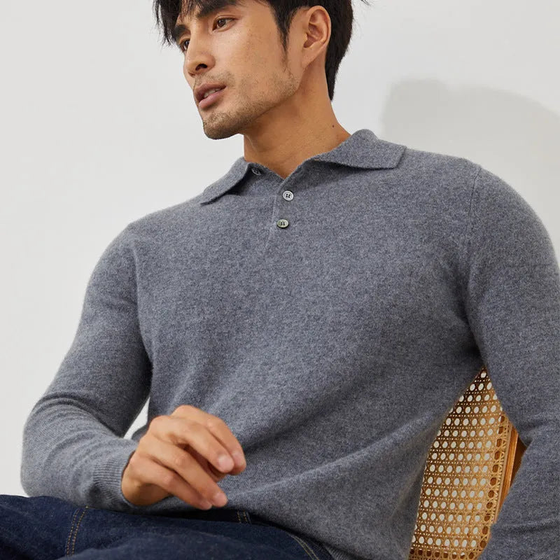 Man wearing a sapphire blue cashmere polo collar pullover sweater with a loose fit
