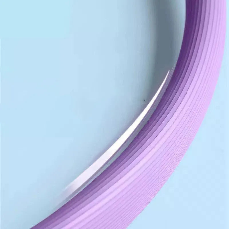 Purple Pilates ring 38cm diameter on a white background for yoga and fitness workouts