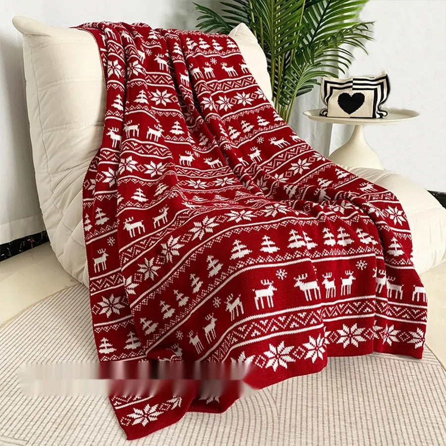 Christmas acrylic blanket showing snowflake or reindeer pattern in casual style