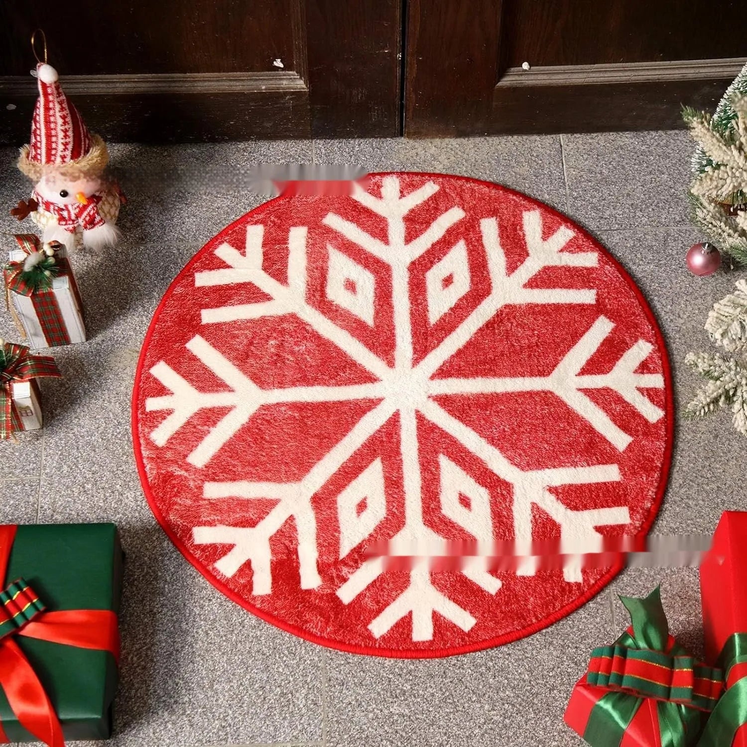Round Christmas carpet with festive blanket design on floor beside holiday decorations