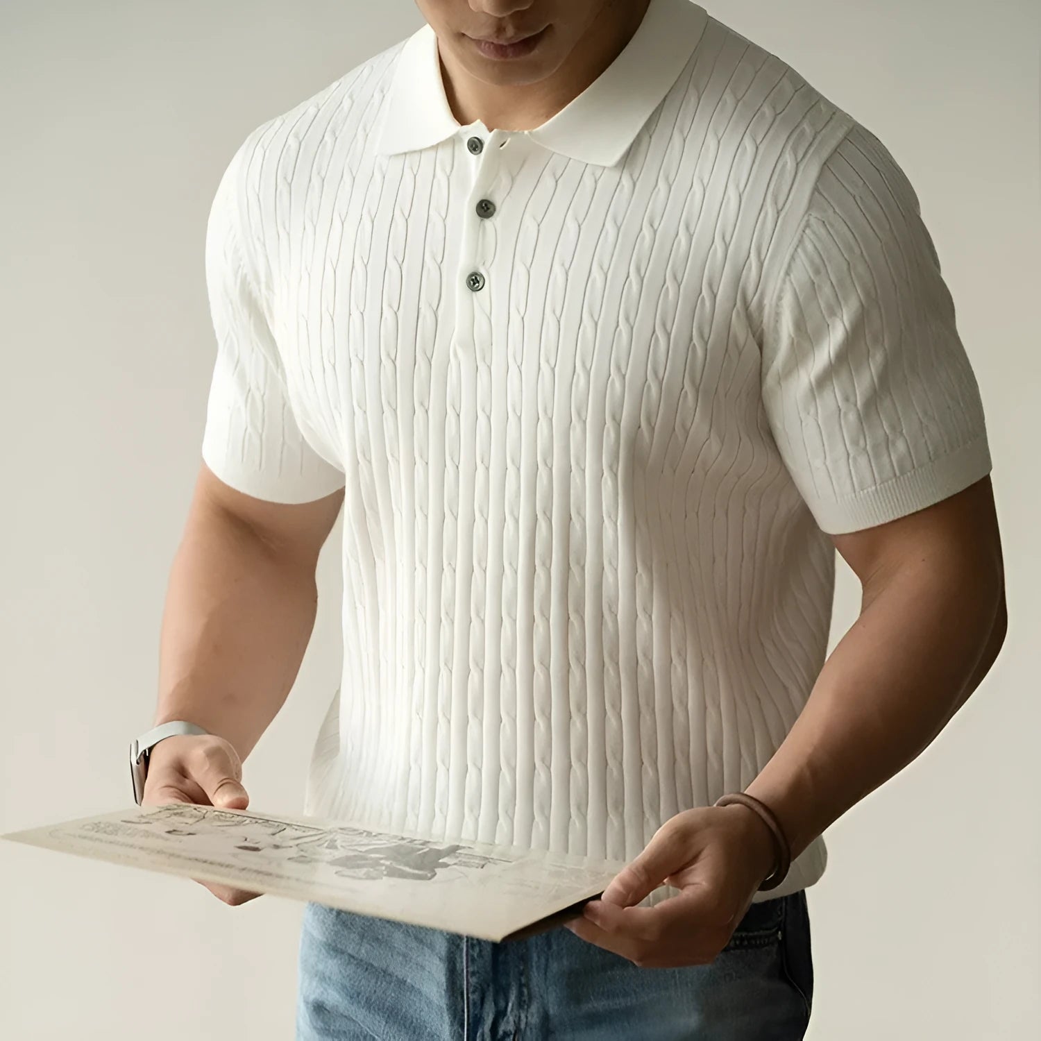 Men's khaki short-sleeve business top on a hanger, showing button placket and tailored fit.