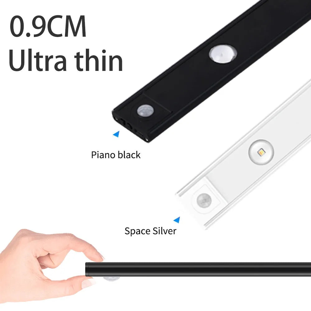 Silver ultra-thin LED light strip with motion sensor mounted inside a wooden wardrobe.