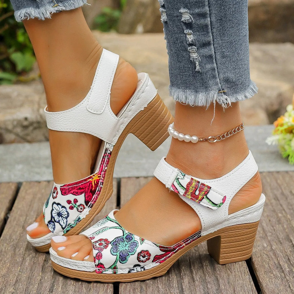 White women's high heel sandals with Velcro buckle fastening on rubber sole