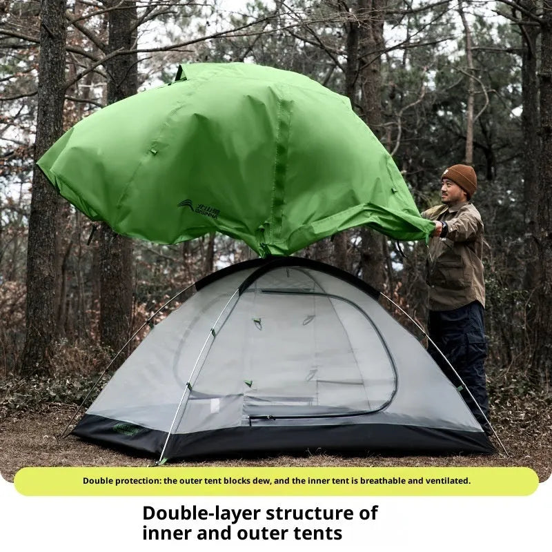 Portable 1-2 person outdoor hiking tent with aluminium rods in Harano Green, set up outdoors