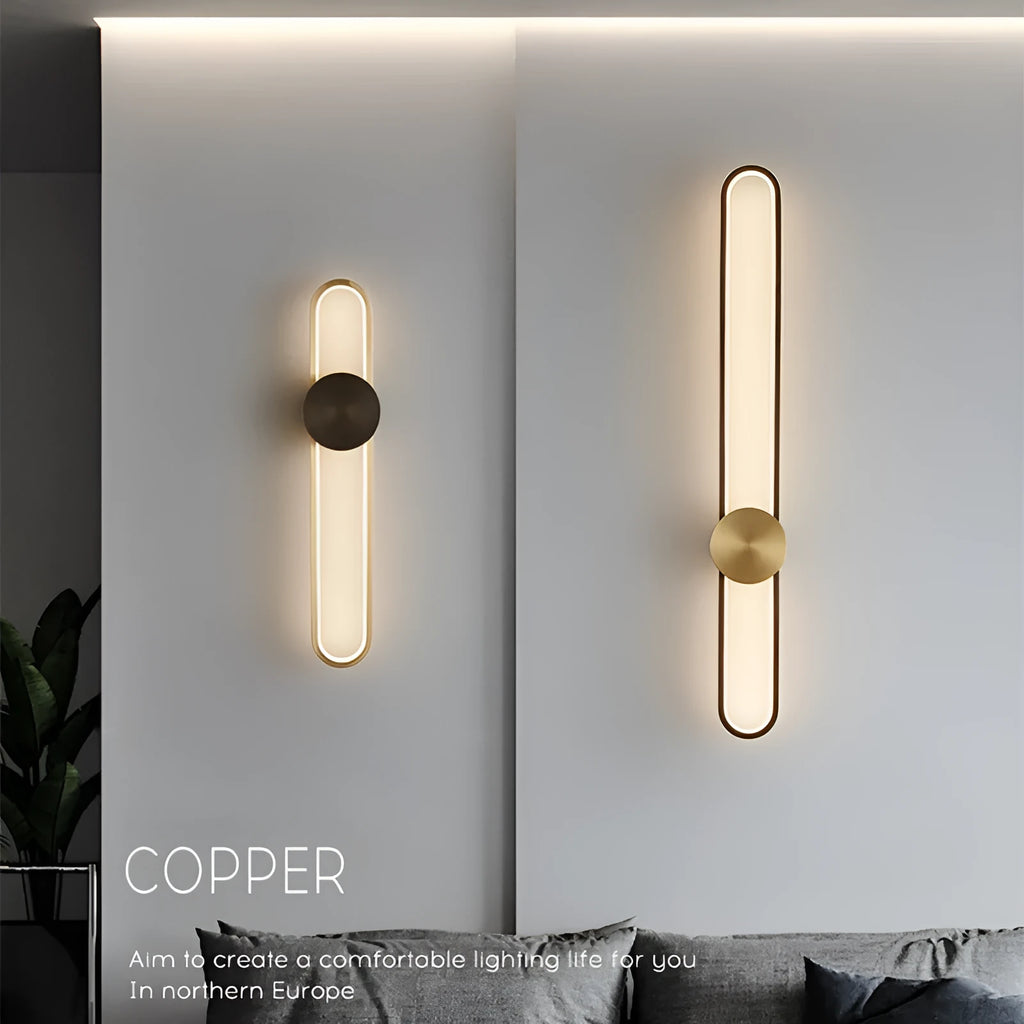 Modern round wall lamp with iron shade in choice of four finishes including black and gold options