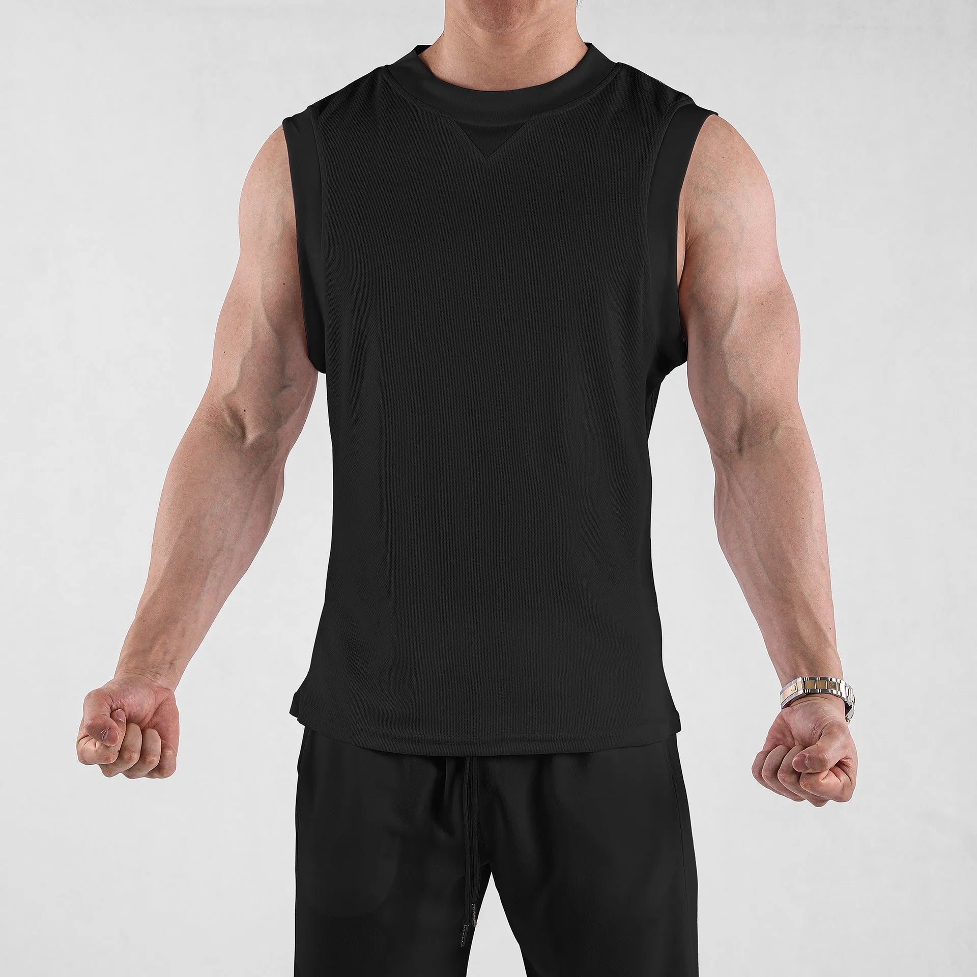 Men's loose-fit black sports vest made from polyester blend fabric for summer wear