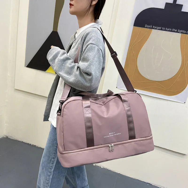 Large capacity waterproof Oxford cloth travel bag in black, unisex design for short business trips and leisure travel