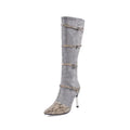 Women's knee-high black boots with stiletto heels and velvet lining