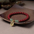 Handmade wave-shaped cinnabar and copper bead bracelet in national style design