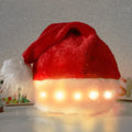 Red and white plush Santa hat with LED lights glowing in multiple colours, pom-pom decoration