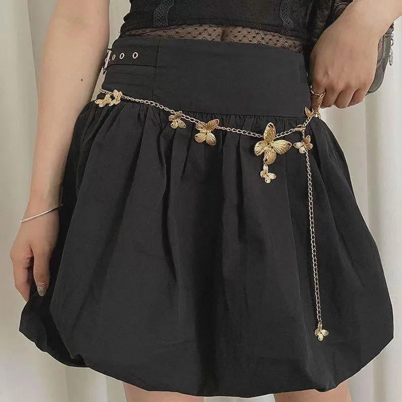 Gold or silver alloy butterfly waist chain belt showing 104cm length and decorative charm.