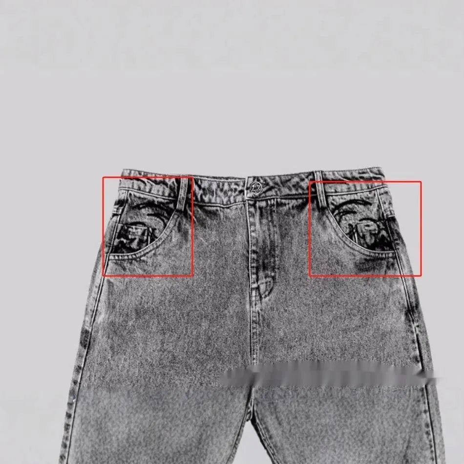 Grey loose-fit straight-leg cotton denim trousers on a mid-waist, shown from the front.