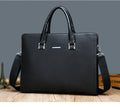 One-shoulder cross-slung male business briefcase in blue with stitching detail and soft handle