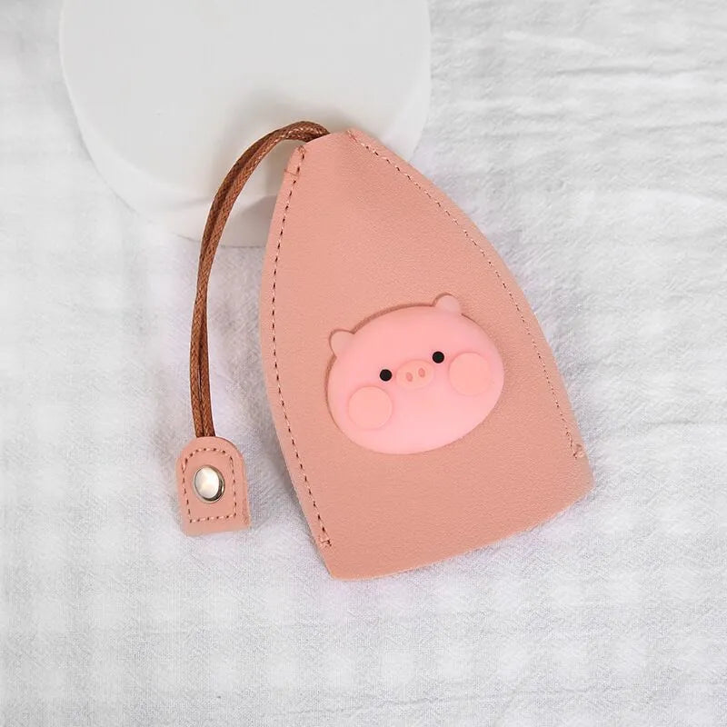 Cartoon design pull-out key case for car keys in PU leather.