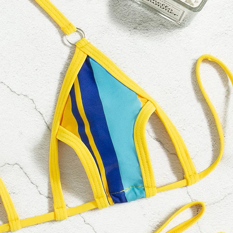 Yellow women's split swimsuit with hollow back design and high-waist shorts