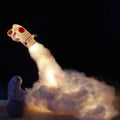 DIY astronaut rocket night light kit with warm LED string lights, plastic chassis, and straws for assembly.