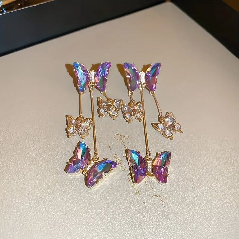 Blue purple butterfly tassel earrings with silver needle crystal flowers, approximately 8 cm drop length