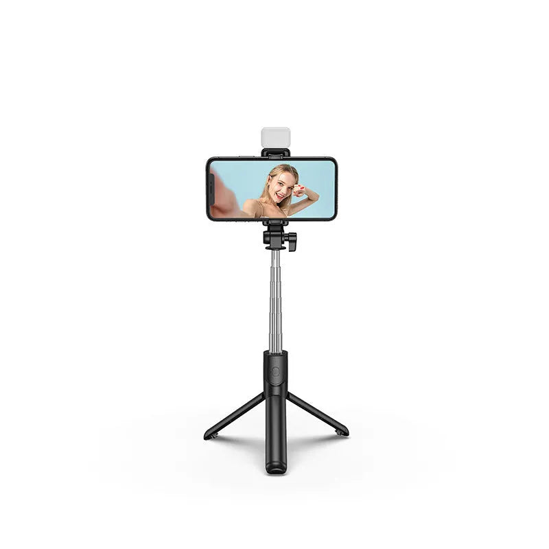 Black aluminium Bluetooth selfie stick tripod with integrated fill light and 360-degree rotating phone holder.