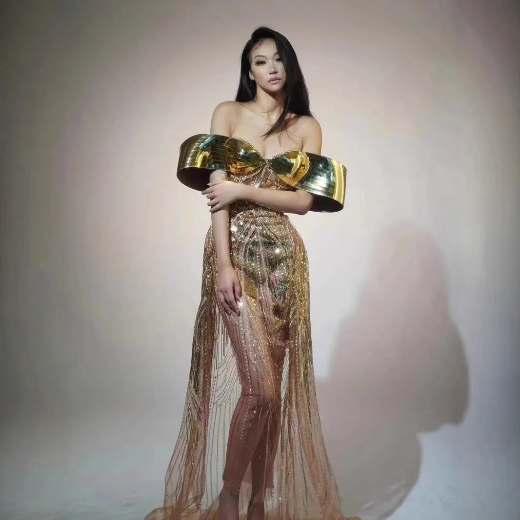 Gold strapless sequined dress with thigh-high split and tulle overlay, formal women's gown