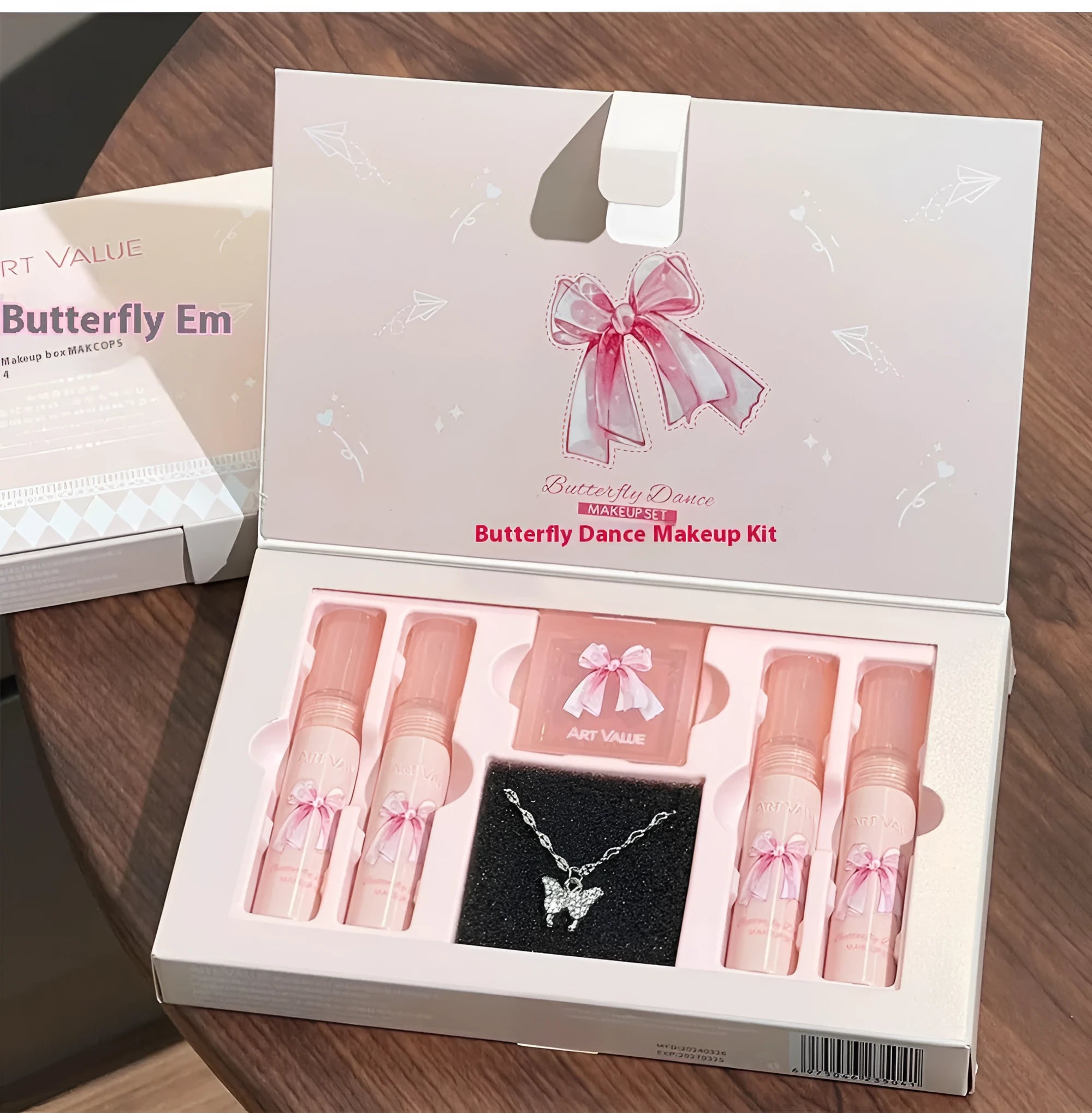 Butterfly Box Suite makeup set with pink lip muds, blush, and necklace