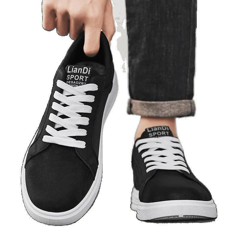 Men's black snake pattern PU leather sneakers with round toe and flat rubber sole.
