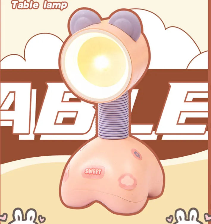DIY cartoon magnetic small night lamp in assorted animal styles and colours on a desktop.