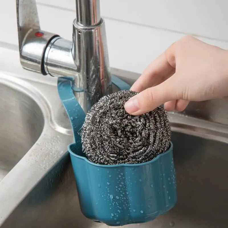 Nordic-style plastic sink drain basket in dark blue measuring 20cm long