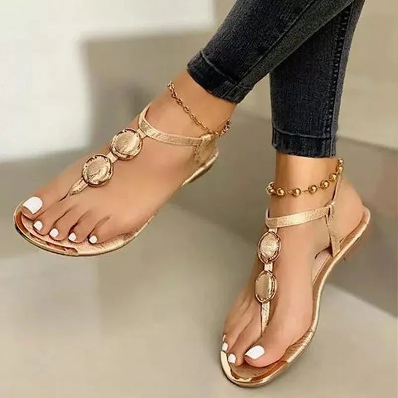 Women's flat sandals with round toe, metal buckle detail, artificial PU upper, in white colour
