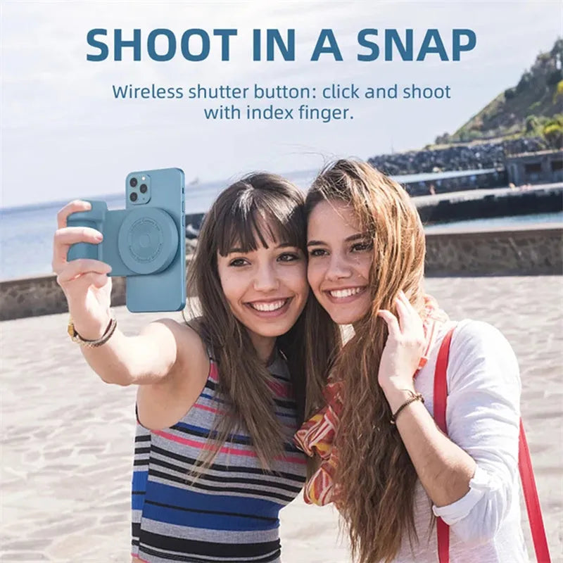 Black magnetic phone camera handle with rotatable design and PU leather grip on wooden table