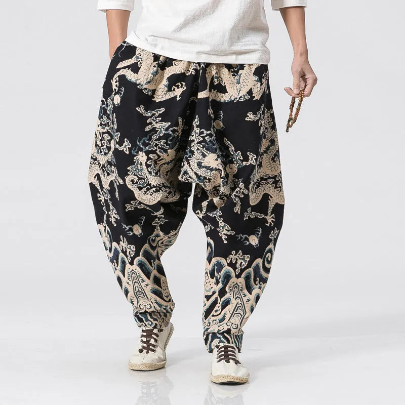 Men's dragon print cross harem trousers with elastic waist and loose leg