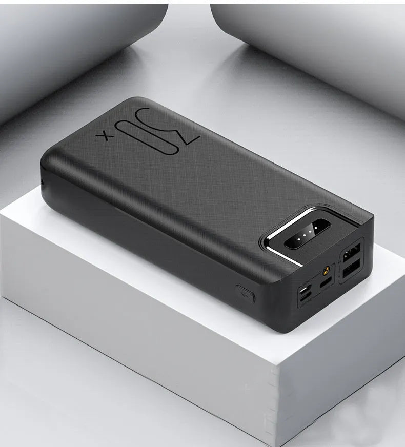30000 mAh RM-30X power bank with black surface cloth texture and LED LCD display