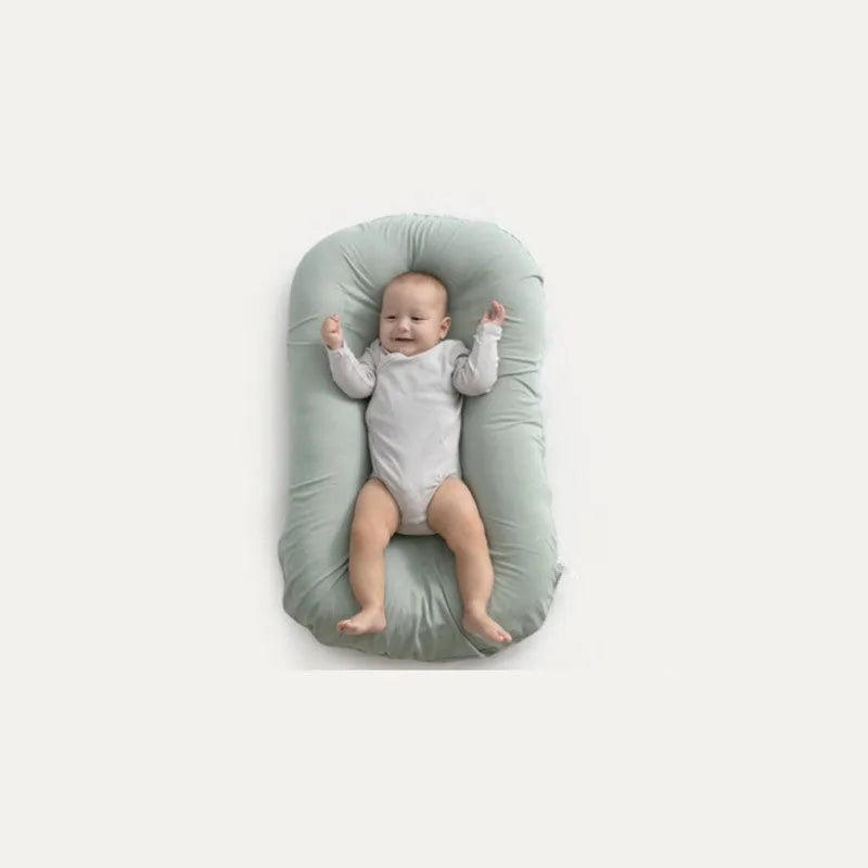 Portable baby nest crib with 75x45cm dimensions in cotton with PP filler