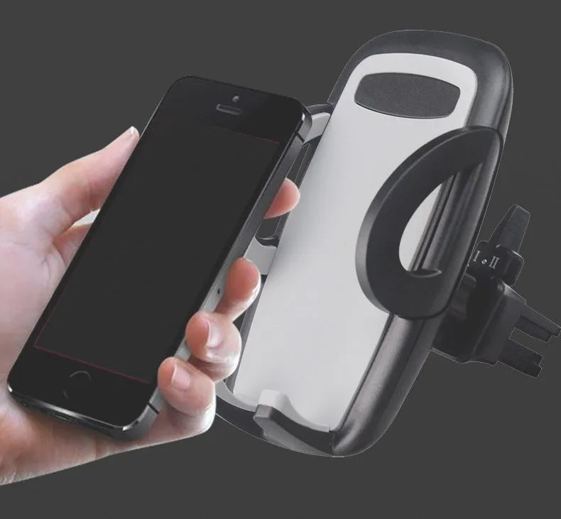 Black universal car mobile phone holder mounted on air conditioning outlet with smartphone secured
