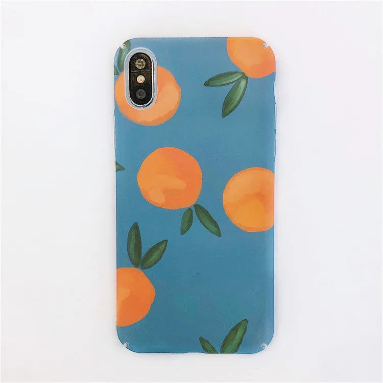 Orange retro plastic iPhone case with water and blue background design on a table.