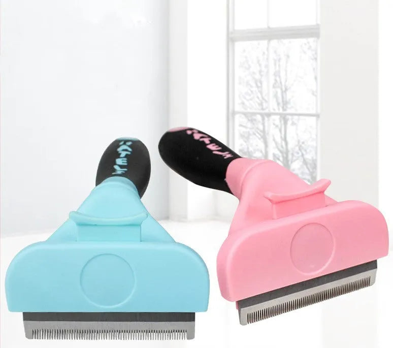 Blue pet grooming float brush with stainless steel pins and rubber cushion on white background