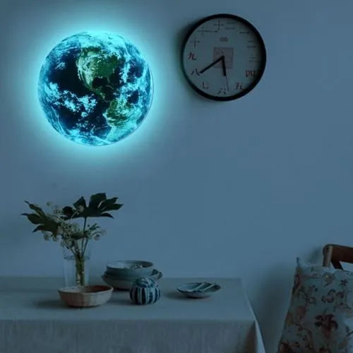 Glow-in-the-dark 3D Earth planet wall sticker showing luminous effect in darkness
