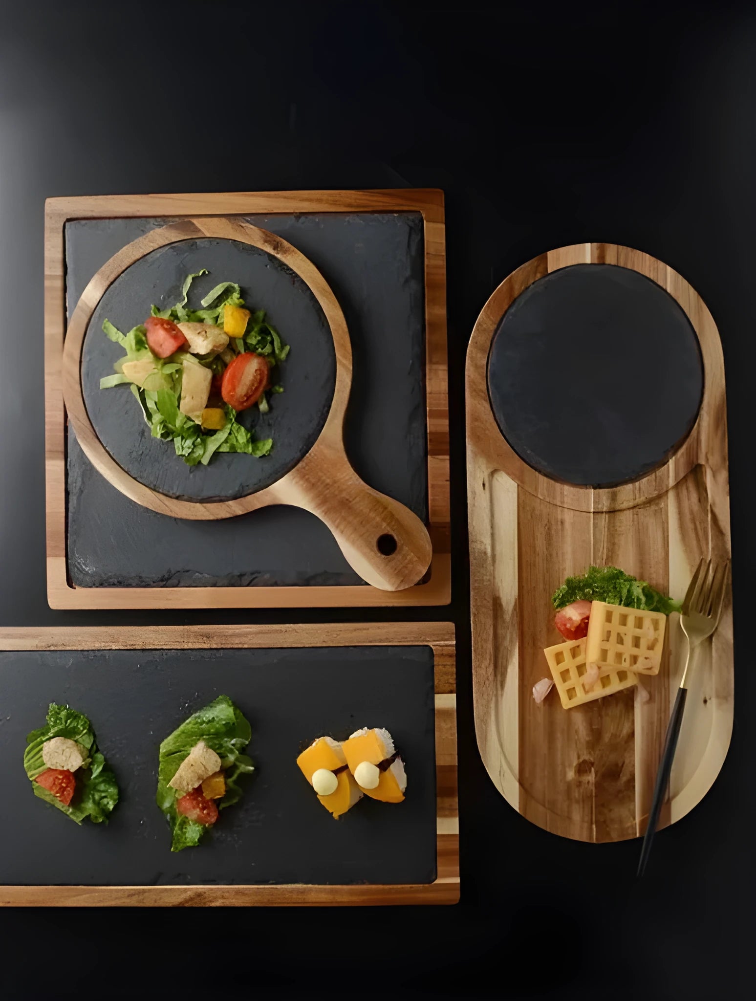 Black wooden pizza dish made from acacia wood and stone, multi-colour sets, on a table