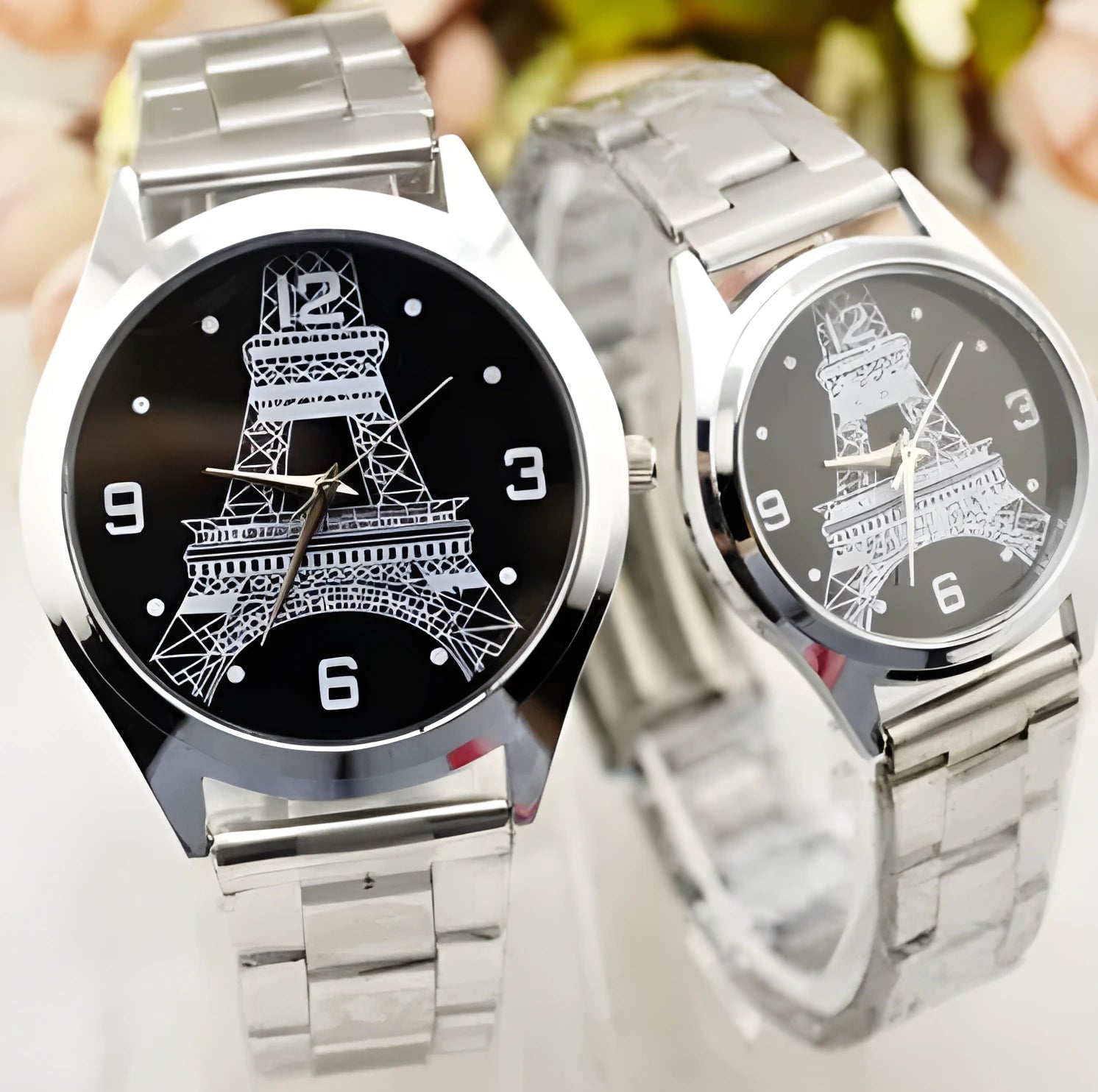 Eiffel Tower wrist watch with black leather strap and Roman numerals on the dial