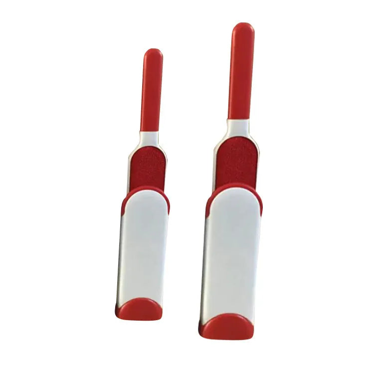 Blue reusable pet hair removal comb with double-sided brush next to its self-cleaning base.