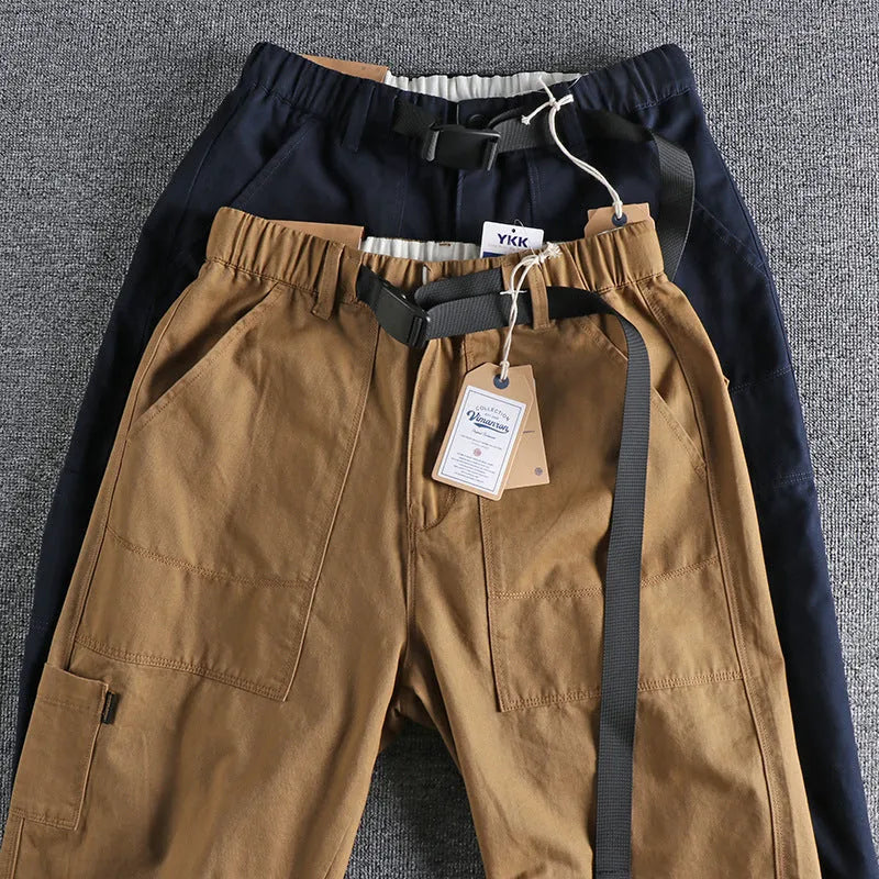 Men's cotton work trousers with buckle belt in khaki colour showing three-dimensional cutting