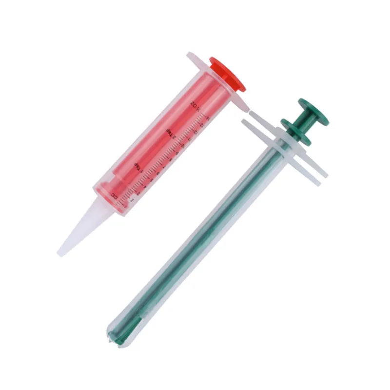 Two pet pill shooters with soft tip syringes for administering tablets to cats and dogs