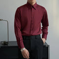 Man wearing a black long sleeve loose fit cardigan in Korean Japanese retro style