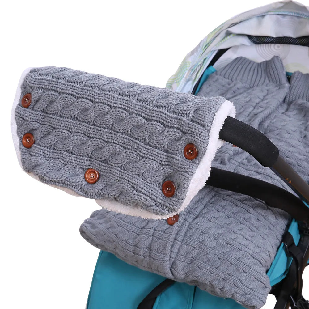 Baby sleeping bag in beige with button opening and matching pram handrail set
