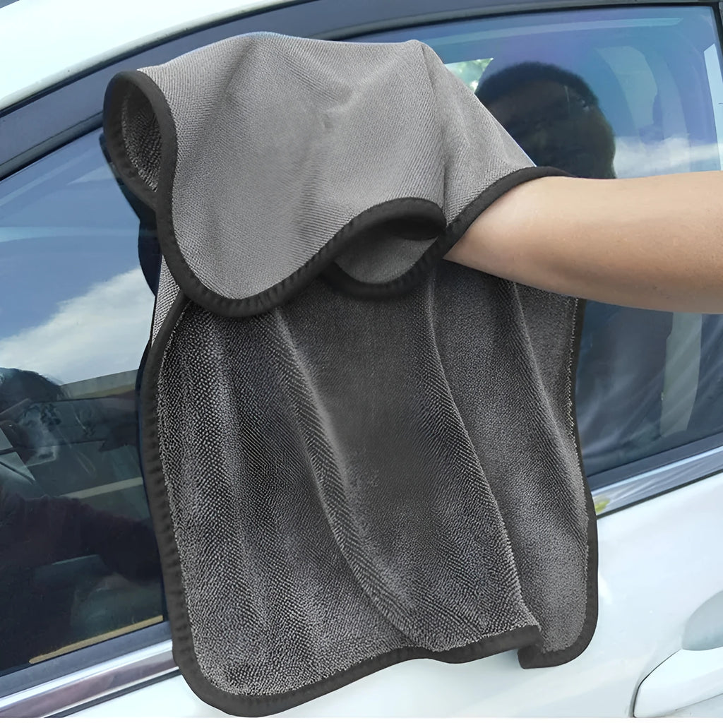 Grey 40x40cm square microfiber car wash and drying towel laid flat.
